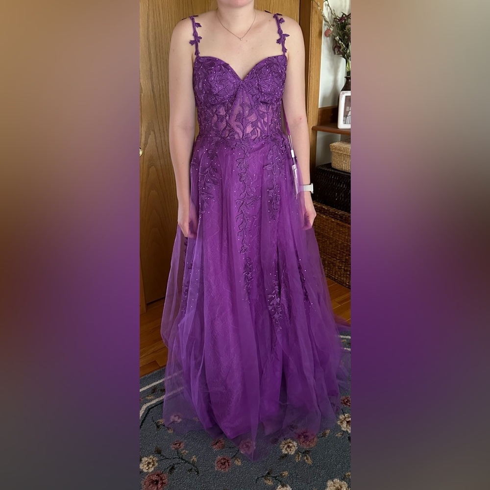 Elegant Purple Gown with Floral Details